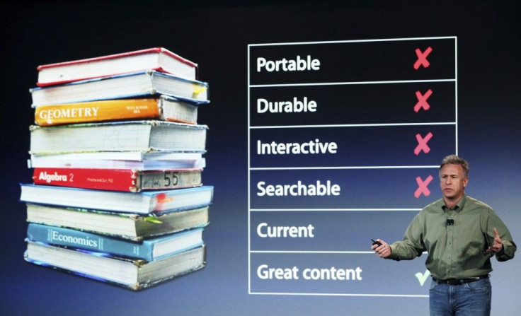Apple Marketing chief Phil Schiller speaks during a news conference introducing a digital textbook service in New York