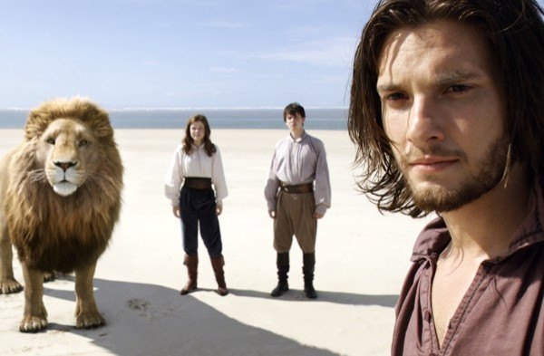 Lucy (georgie Henley, center), Edmund (Skandar Keynes) and Caspian (Ben Barnes) are reunited with their friend and protector, the "Green Lion" Aslan.