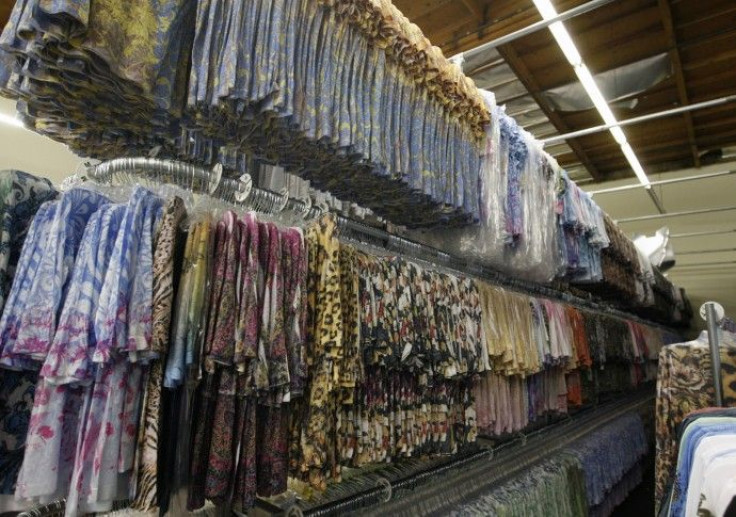Racks of women's t-shirts are stacked in the warehouse at the Sledge USA clothing factory in Los Angeles October 13, 2009. U.S. store chains are hedging a major bet they made this year by slashing inventories, sometimes as much as 25 percent, to make sure