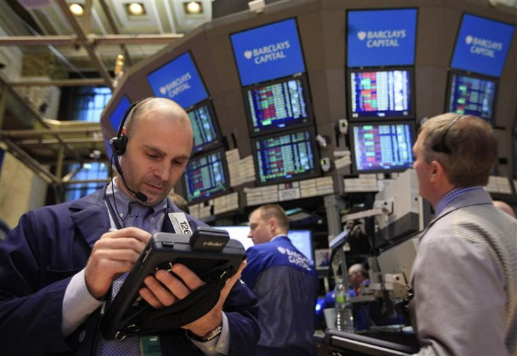 Traders work on the floor of the New York Stock Exchange