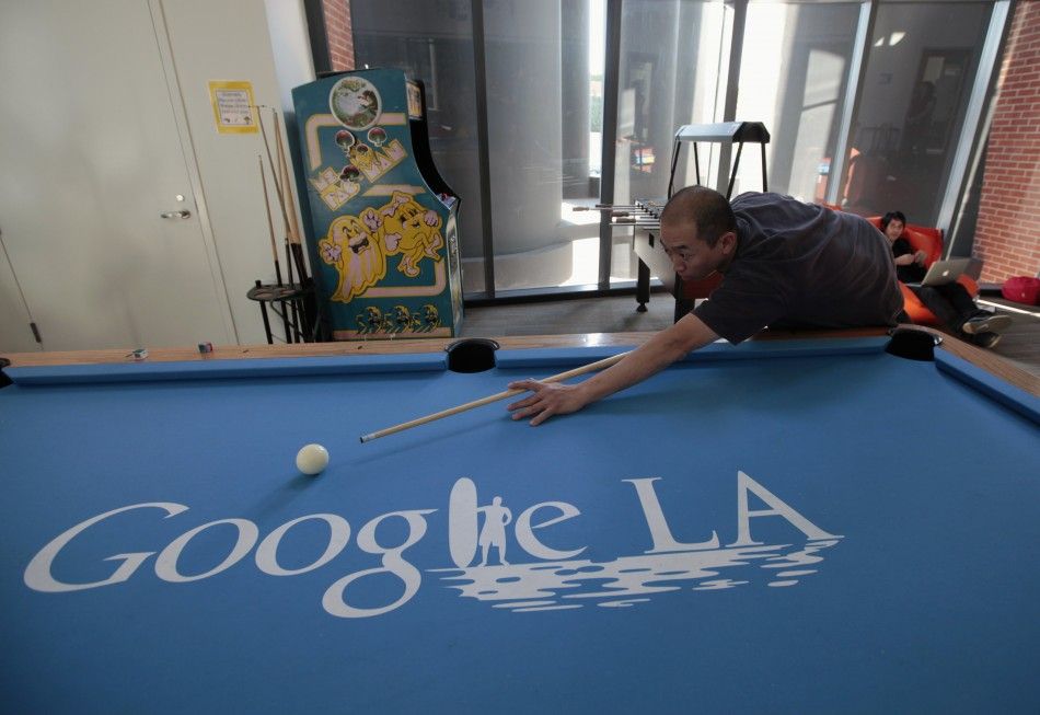 An employee plays pool at the Google campus near Venice Beach, in Los Angeles,