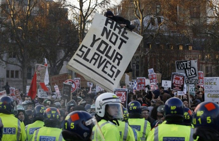 Demonstrators clash with police during a protest in Westminster in central London