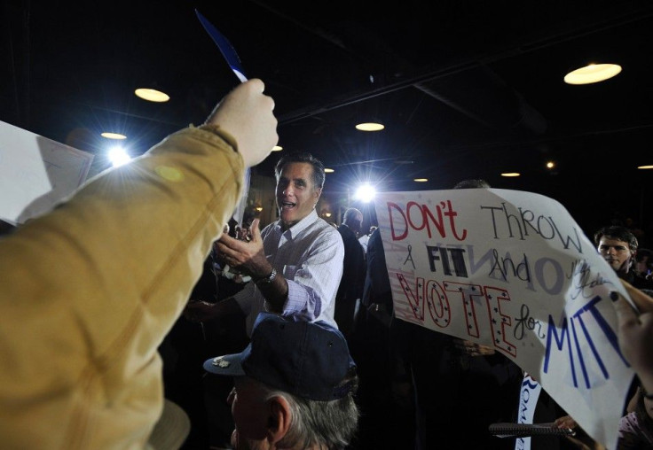 U.S. Republican presidential candidate and former Massachusetts Governor Mitt Romney signs autographs during a campaign stop at Larkin&#039;s Sawmill in Greenville, South Carolina January 20, 2012.