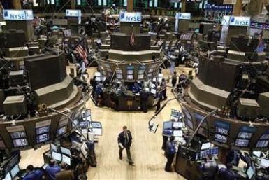 Traders work on the floor of the New York Stock Exchange,