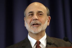 Federal Reserve Chairman Ben Bernanke delivers opening remarks at a conference in Washington