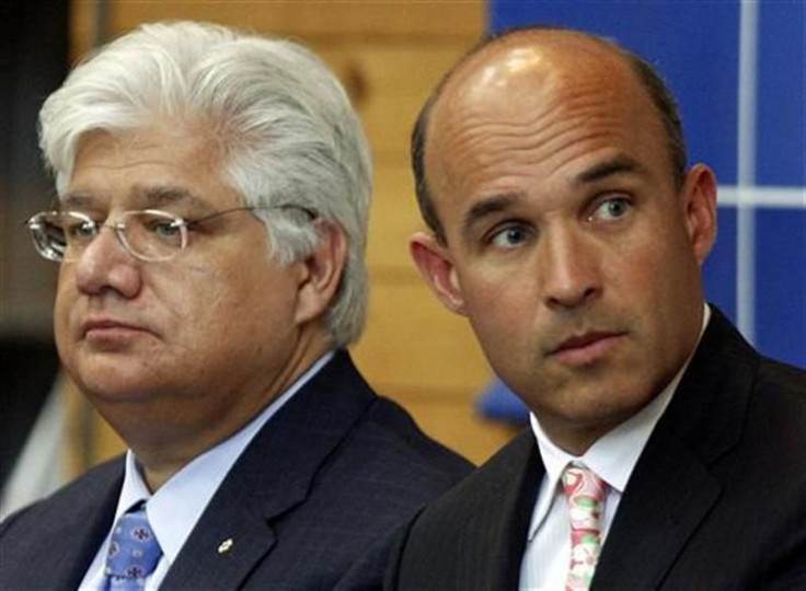 Research in Motion co-CEO Jim Balsillie and President and co-CEO Mike Lazaridis listen during the annual general meeting of shareholders in Waterloo