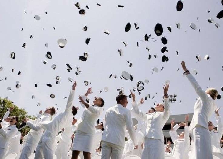 U.S. Coast Guard Academy graduates celebrate after a ceremony in New London, Connecticut, May 23, 2007.