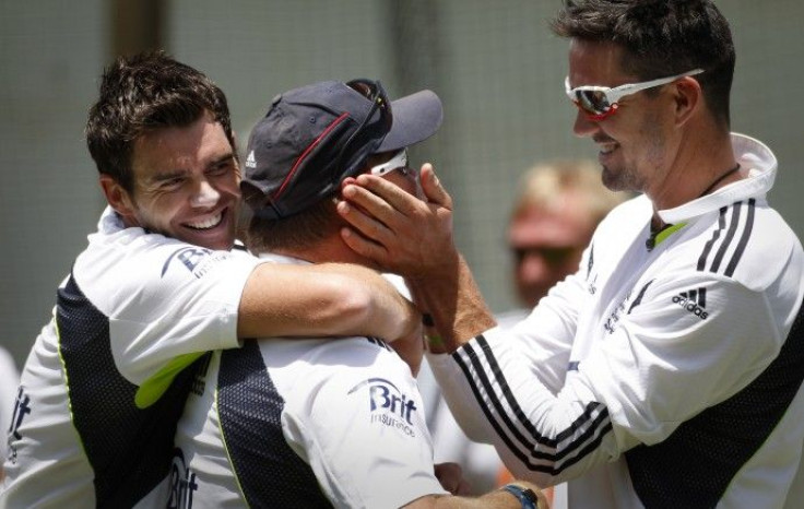Anderson and Pietersen joke around with bowling coach Saker during a practice session at the WACA ground in Perth.