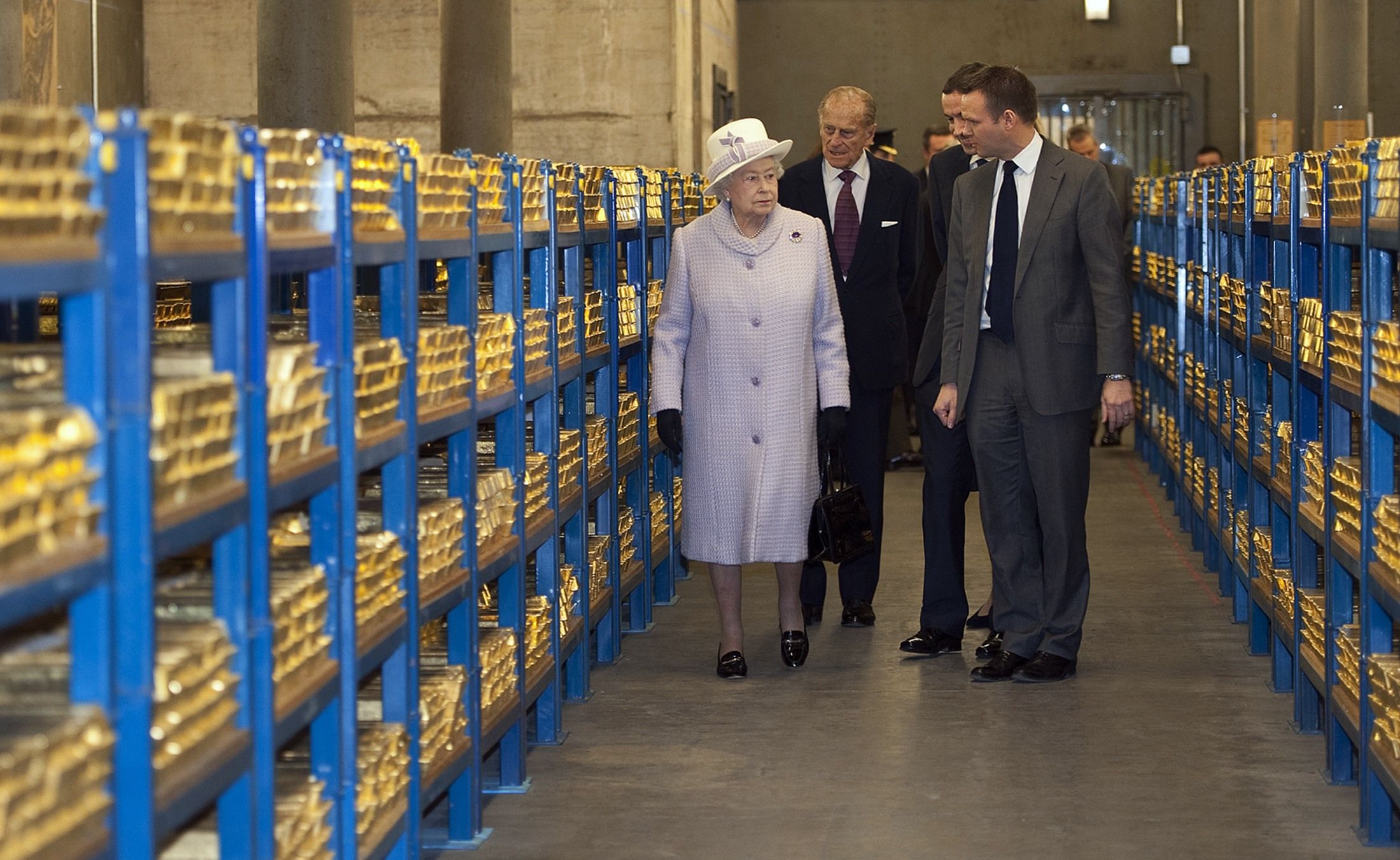 Unlike most other people, the Queen was allowed to touch and verify the gold.
