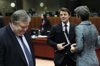 Greece&#039;s Finance Minister Venizelos, French counterpart Baroin (C) and Danish Economy Minister Vestager attend the EU finance ministers meeting in Brussels