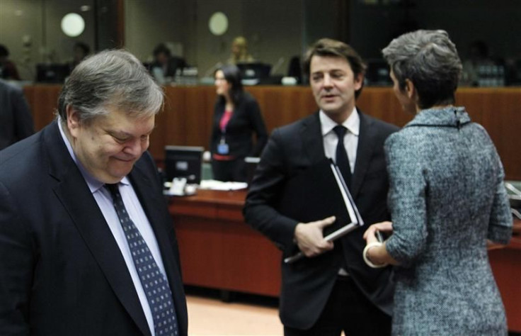 Greece&#039;s Finance Minister Venizelos, French counterpart Baroin (C) and Danish Economy Minister Vestager attend the EU finance ministers meeting in Brussels