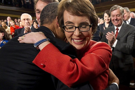 Giffords hugs Obama