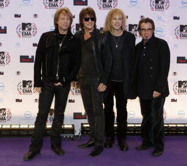 Members of Bon Jovi pose for photographers as they arrive for the MTV Europe Music Awards 2010 in Madrid