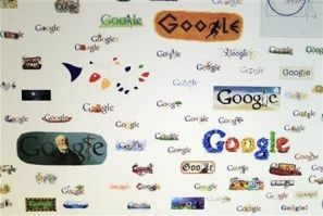 Google homepage logos are seen on a wall at the Google campus near Venice Beach, in Los Angeles, California January 13, 2012.