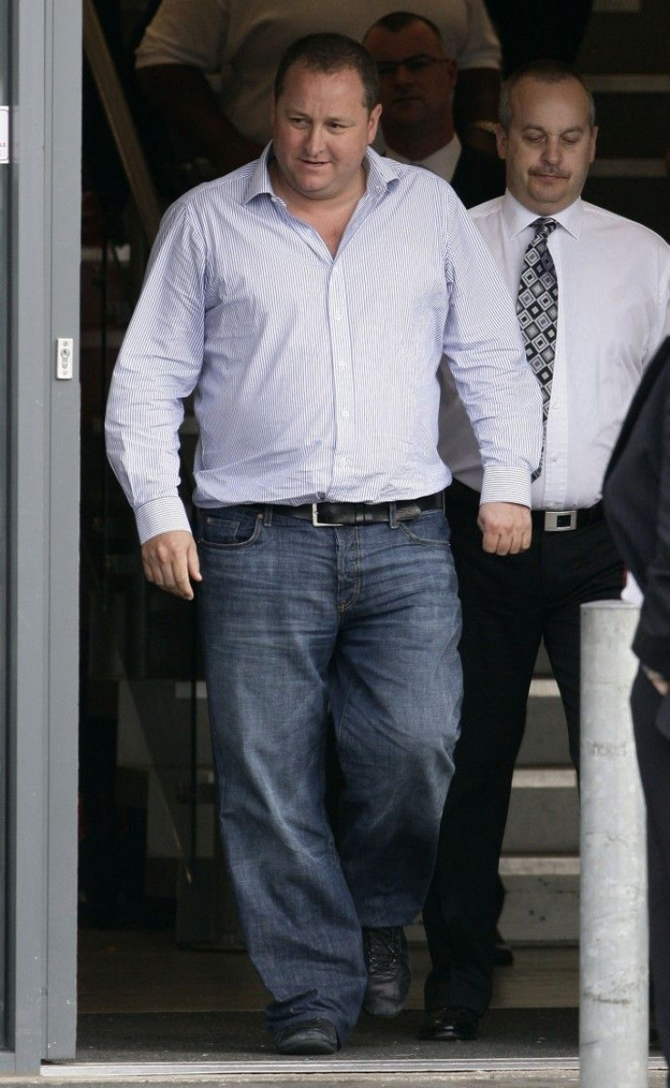 Newcastle United owner Mike Ashley leaves after an annual general meeting of Sports Direct 