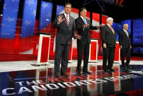 Republican presidential candidates arrive on stage before the Republican presidential candidates debate in Tampa