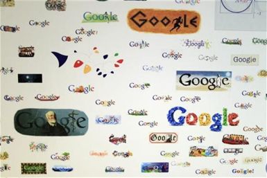 Google homepage logos are seen on a wall at the Google campus near Venice Beach, in Los Angeles