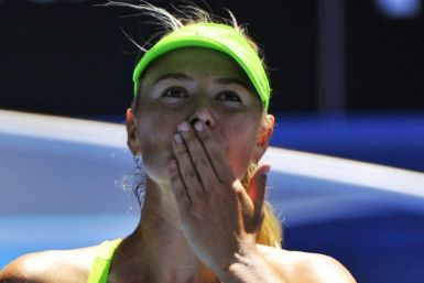 Sharapova of Russia blows a kiss to the crowd after defeating Makarova of Russia in their quarter-finals match at the Australian Open in Melbourne
