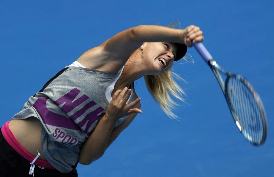 Maria Sharapova of Russia serves during a practice session before the Australian Open tennis tournament in Melbourne
