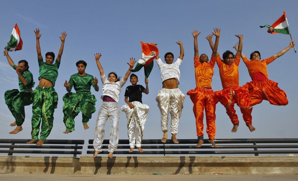 College students dressed in the colours of India039s national flag.