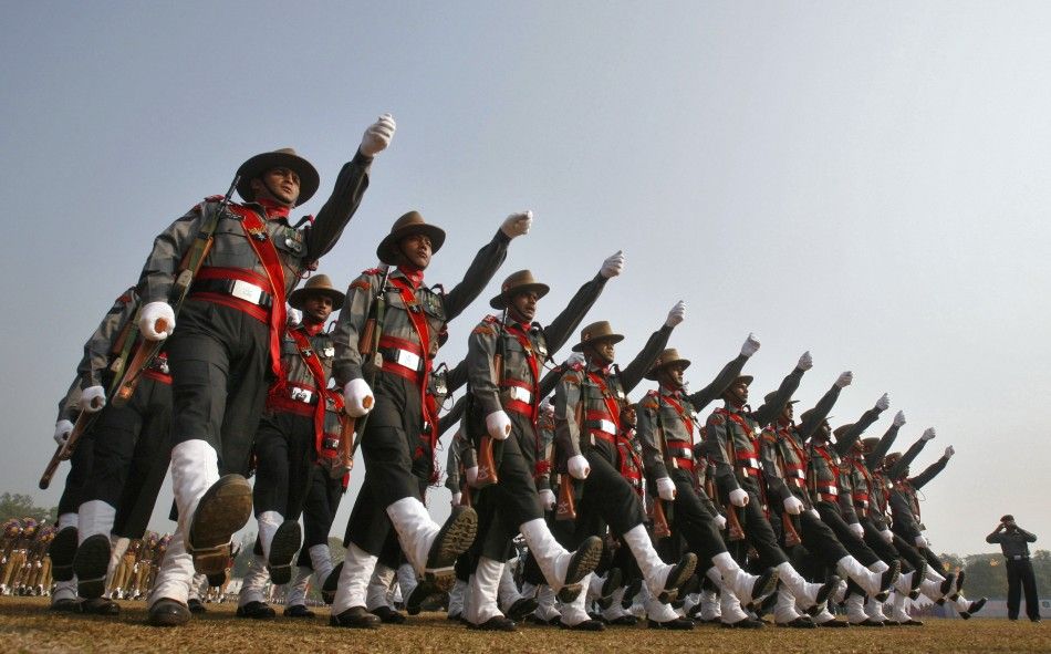 Indian soldiers march during the Republic Day celebrations in Agartala