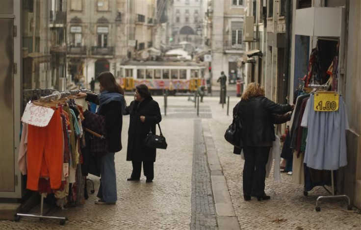 A shop sells garments for one euro in downtown Lisbon