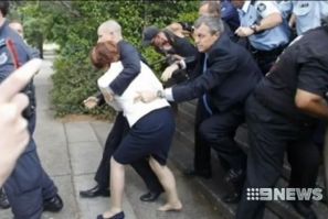 Australian PM Julia Gillard Attacked by Angry Protesters, Dragged to Safety by Bodyguard