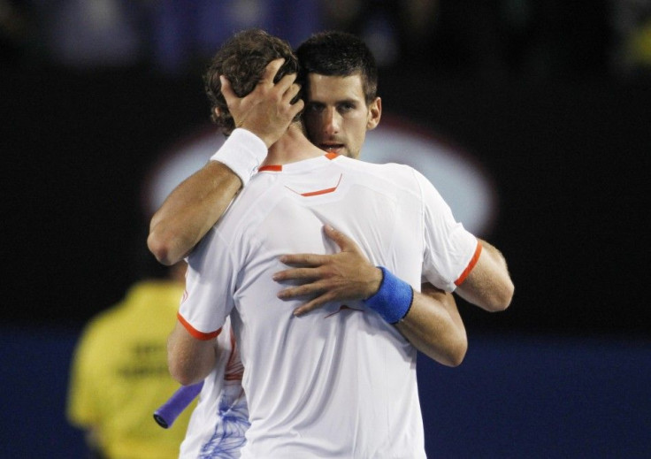 Novak Djokovic embraces Andy Murray