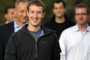 Mark Zuckerberg walks out to speak to reporters at Harvard University in Cambridge