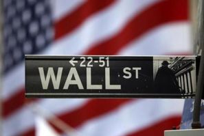 The Wall Street sign is seen outside the New York Stock Exchange
