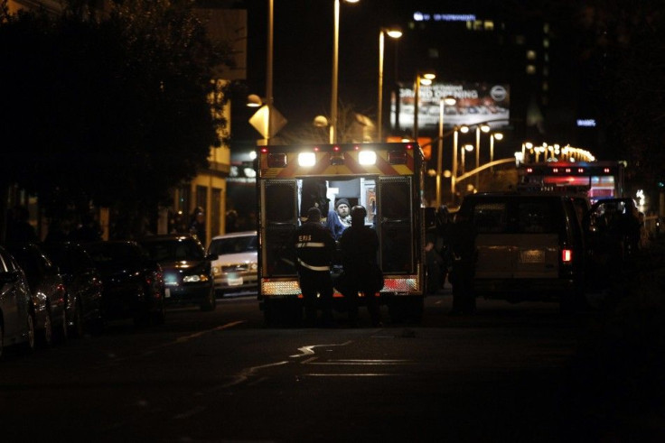 An Occupy Oakland demonstrator is loaded into an ambulance during a mass arrest outside a YMCA after a day-long demonstration in Oakland, California January 28, 2012.