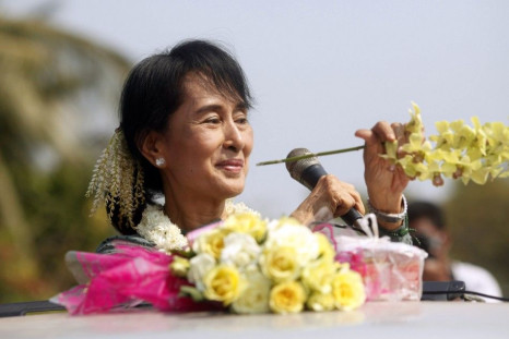Myanmar opposition leader Aung San Suu Kyi speaks to supporters from a vehicle at Yae Phyu village in Dawei township January 29, 2012.