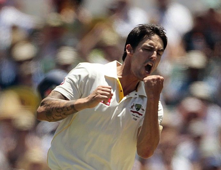 Australia's Johnson celebrates the wicket of England's Trott during their third Ashes test in Perth