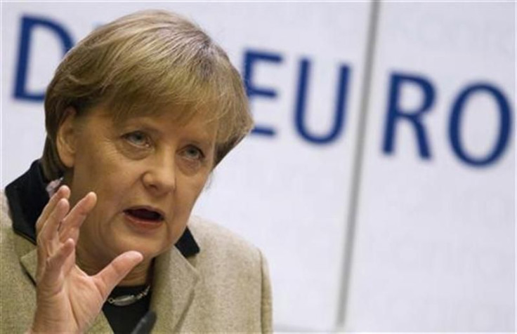 German Chancellor Merkel speaks during a ceremony marking the 10th anniversary of the physical introduction of the Euro as official currency of the Eurozone in Berlin