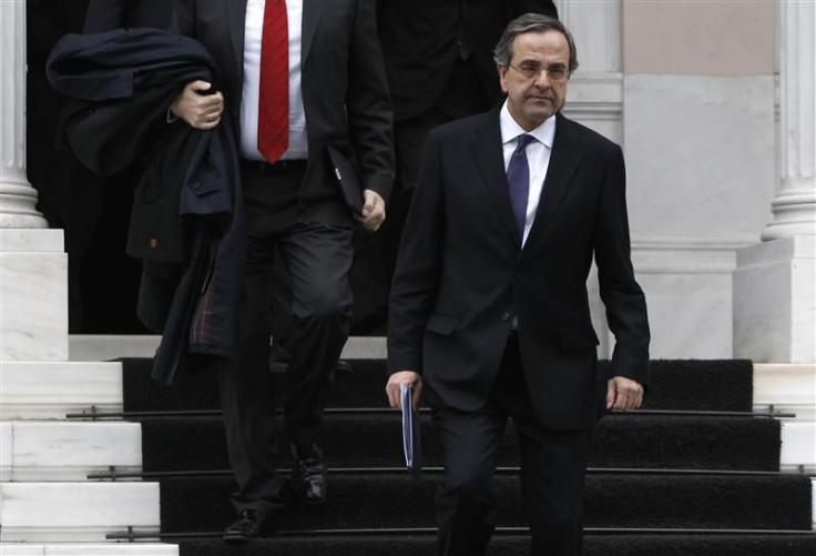 Conservative party leader Antonis Samaras leaves the Greek prime minister&#039;s office after a meeting in Athens