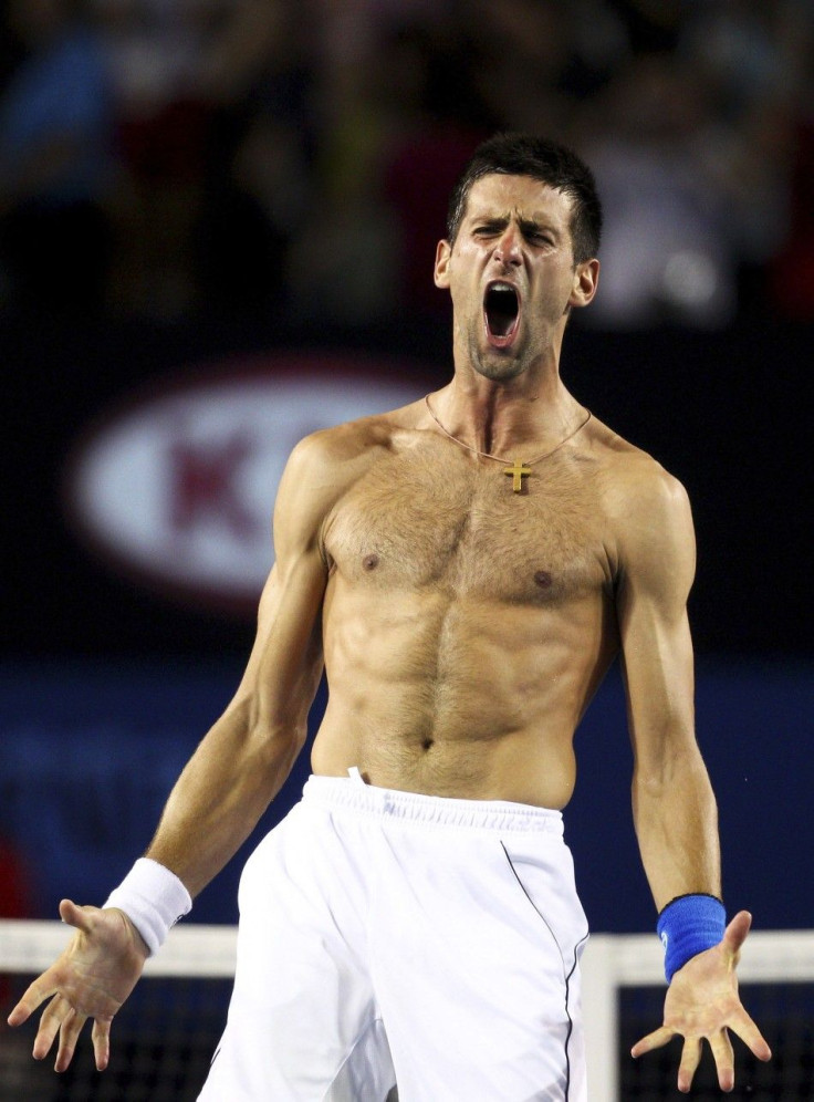 Novak Djokovic of Serbia celebrates after defeating Rafael Nadal of Spain in their men's singles final match at the Australian Open tennis tournament in Melbourne 