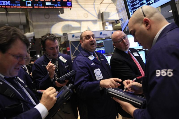 Traders work on the floor of the New York Stock Exchange