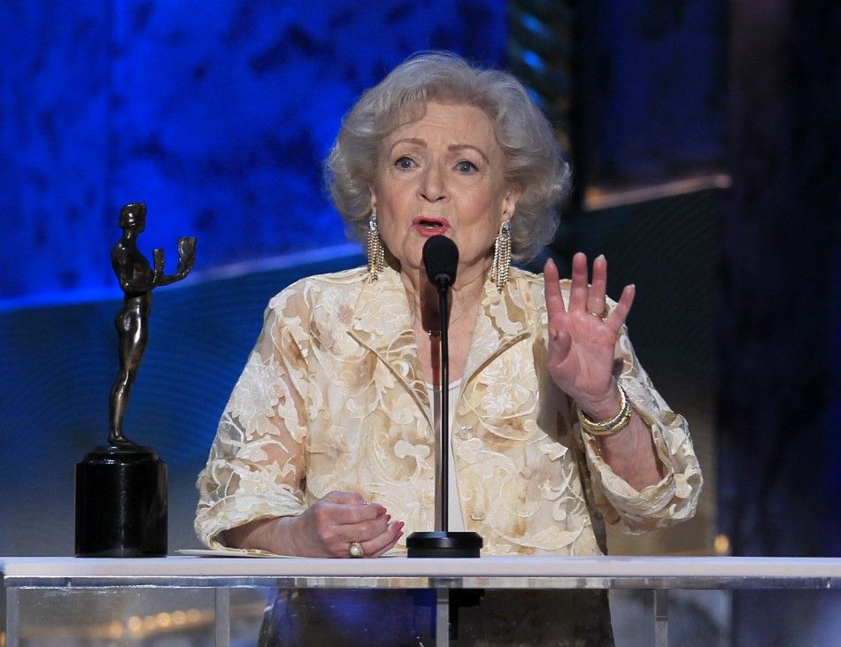 Actress Betty White accepts the award for outstanding performance by a female actor in a comedy series for quotHot in Clevelandquot, at the 18th annual Screen Actors Guild Awards in Los Angeles, California January 29, 2012.