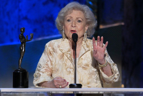 Actress Betty White accepts the award for outstanding performance by a female actor in a comedy series for &quot;Hot in Cleveland&quot;, at the 18th annual Screen Actors Guild Awards in Los Angeles, California January 29, 2012.