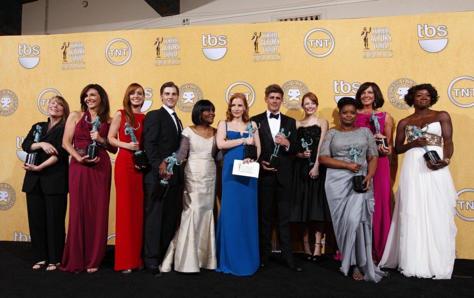 The cast of quotThe Helpquot poses for photographs backstage with their awards for outstanding performance by a cast in a motion picture at the 18th annual Screen Actors Guild Awards in Los Angeles, California January 29, 2012.