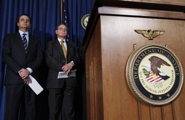 Preet Bharara (L), the United States Attorney for the Southern District of New York, stands with Irving Picard, the Securities Investor Protection Act (SIPA) Trustee, during a news conference announcing an agreement to recover $7.2 billion for victims of