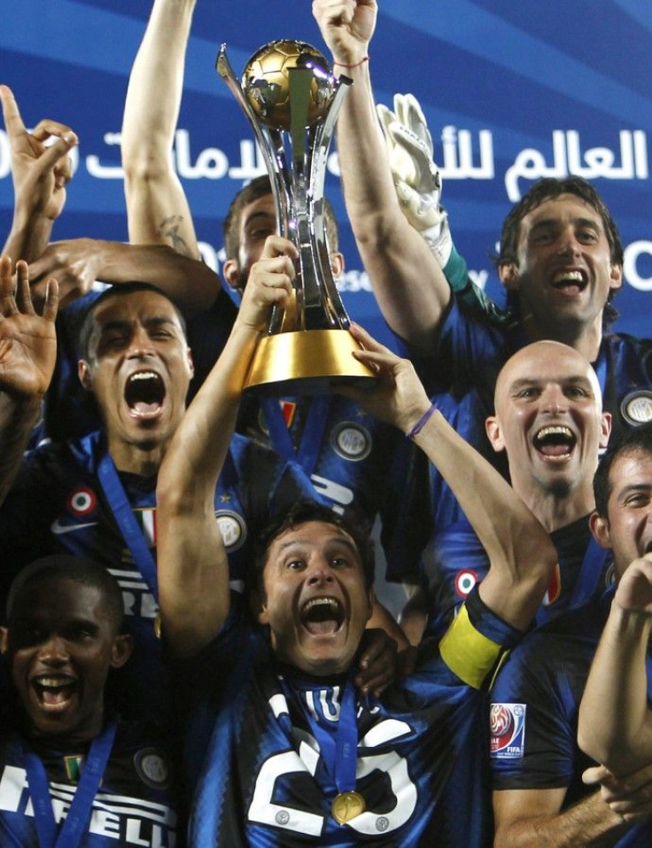 Javier Zanetti of Italy's Inter Milan lifts the Club World Cup 2010 trophy after winning their final soccer match against DR Congo's TP Mazembe at Zayed Sports City in Abu Dhabi.