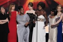 The cast of &quot;The Help&quot; accept the award for outstanding performance by a cast in a motion picture at the 18th annual Screen Actors Guild Awards in Los Angeles, California