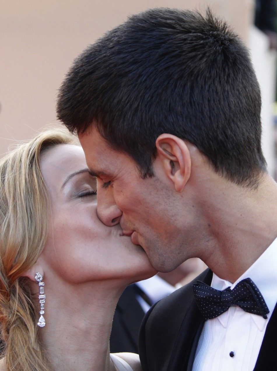 Serbia039s tennis player Novak Djokovic and his girlfriend Jelena Ristic kiss as they arrive on the red carpet for the screening of the film quotThe Beaverquot at the 64th Cannes Film Festival, May 17, 2011.