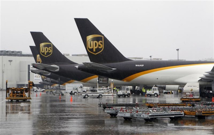 UPS cargo aircraft are loaded with air containers full of packages bound for their final destination at the UPS Worldport All Points International Hub in Louisville