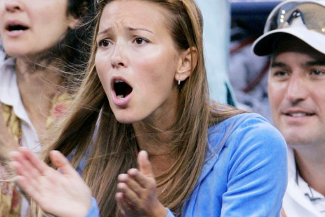 Jelena Ristic, girlfriend of Novak Djokovic of Serbia, reacts during Djokovic's match at the Australian Open tennis tournament in Melbourne.