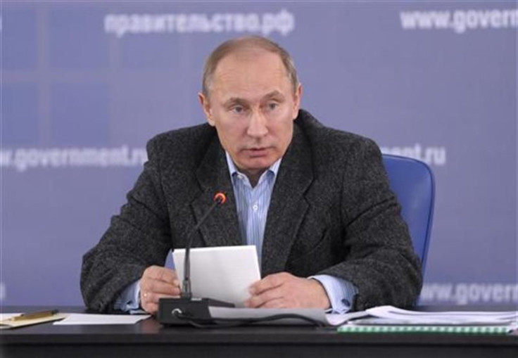 Russian PM Putin speaks during a meeting of a government commission on technology and innovation in the Leningrad region near St.Petersburg