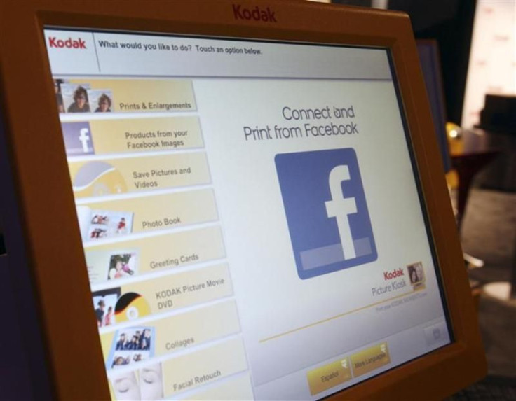 A Facebook logo is displayed on Kodak photo kiosk during the 2012 International Consumer Electronics Show (CES) in Las Vegas