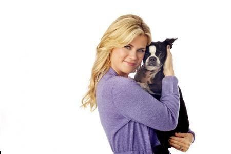 Television personality Alison Sweeney poses with her Boston Terrier ''Winky'' in this publicity photo released to Reuters