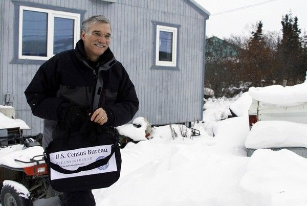 U.S. Census Bureau Director Robert M. Groves walks out of the home of eighty-nine year-old village elder and World War II veteran Clifton Jackson in Noorvik, Alaska in this January 25, 2010 handout.